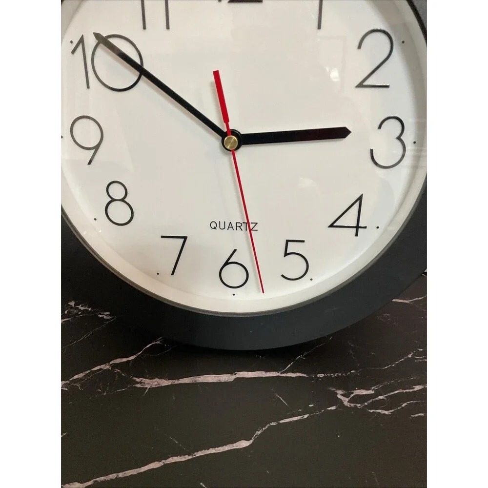 Universal Wall Clock 9 3/4 In Diameter Black Case
